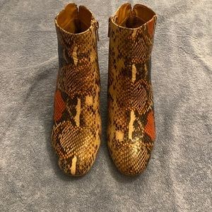 Rouge snakeskin booties